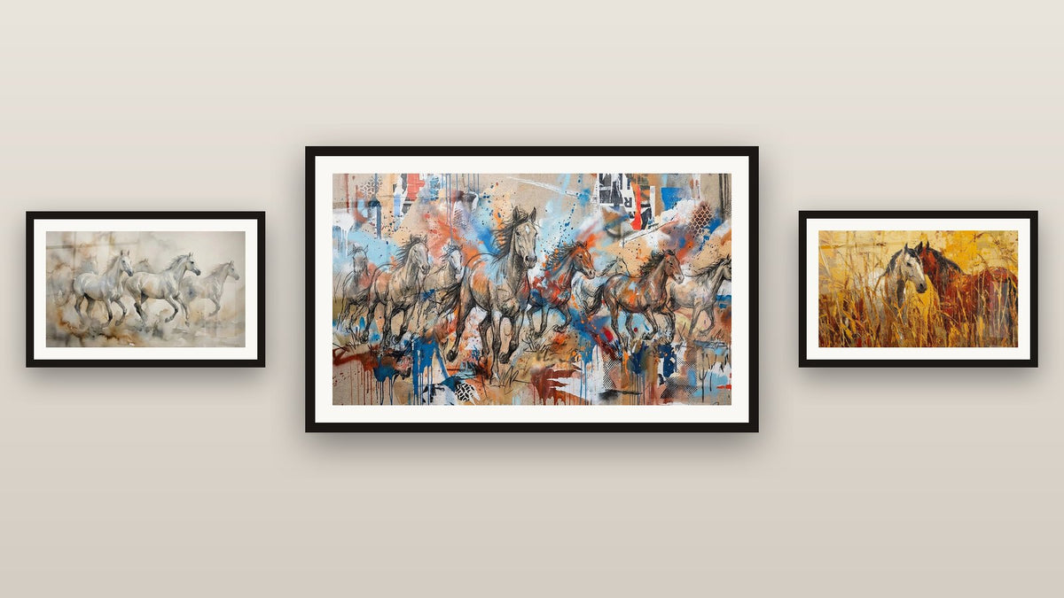 Gallery wall with three framed paintings, including Wild Horses and White Horses Galloping