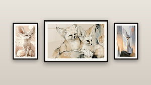 Gallery wall with three framed paintings, including White and Orange Fennec Fox Among Reeds
