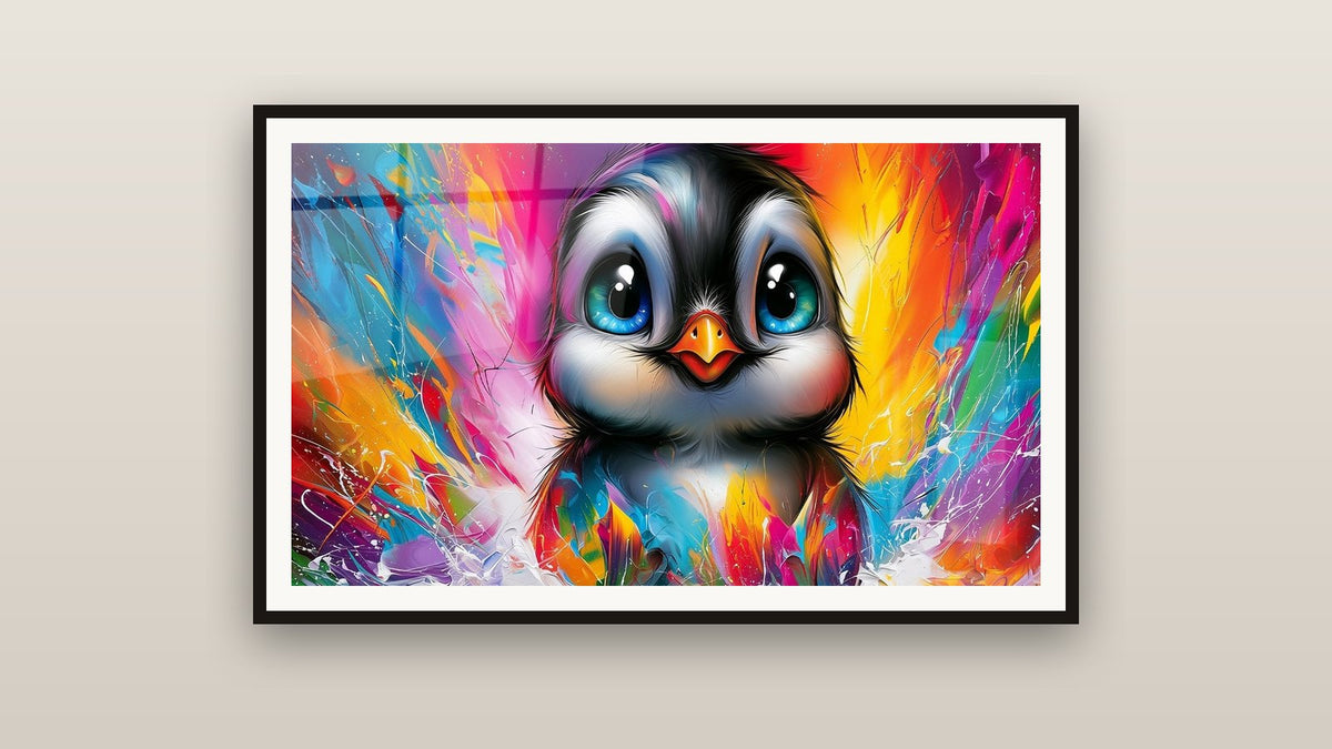 Tableau encadré sur un mur : Bébé pingouin aux yeux bleus éclatants