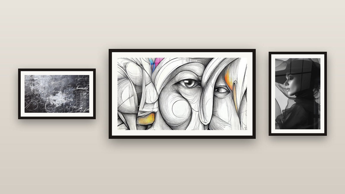 Gallery wall with three framed paintings: Abstract Calligraphy, Abstract feminine face and Woman with Black and Grey Veil
