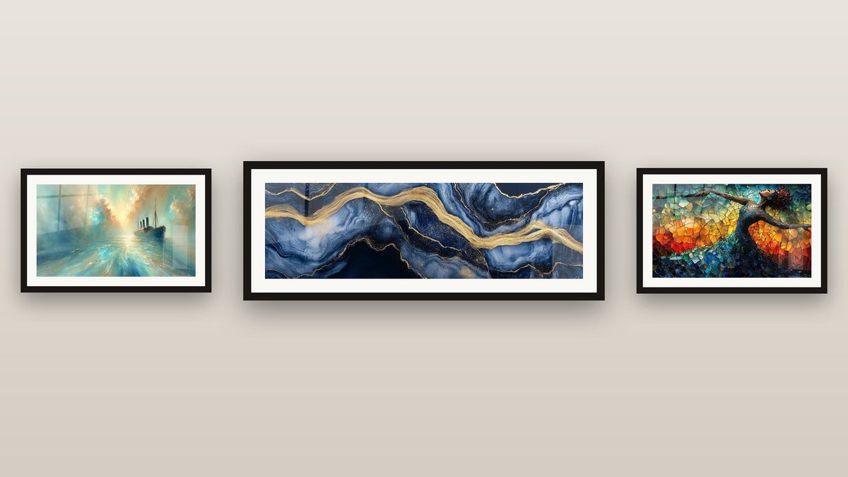 Gallery wall with three framed paintings: Heart of the Breeze, Dance Fire Liberation Red and Liquid Marble Eternity Blue