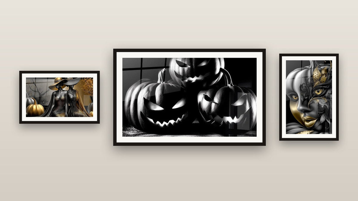 Gallery wall with three framed paintings, including Pumpkins Sinister Smiles