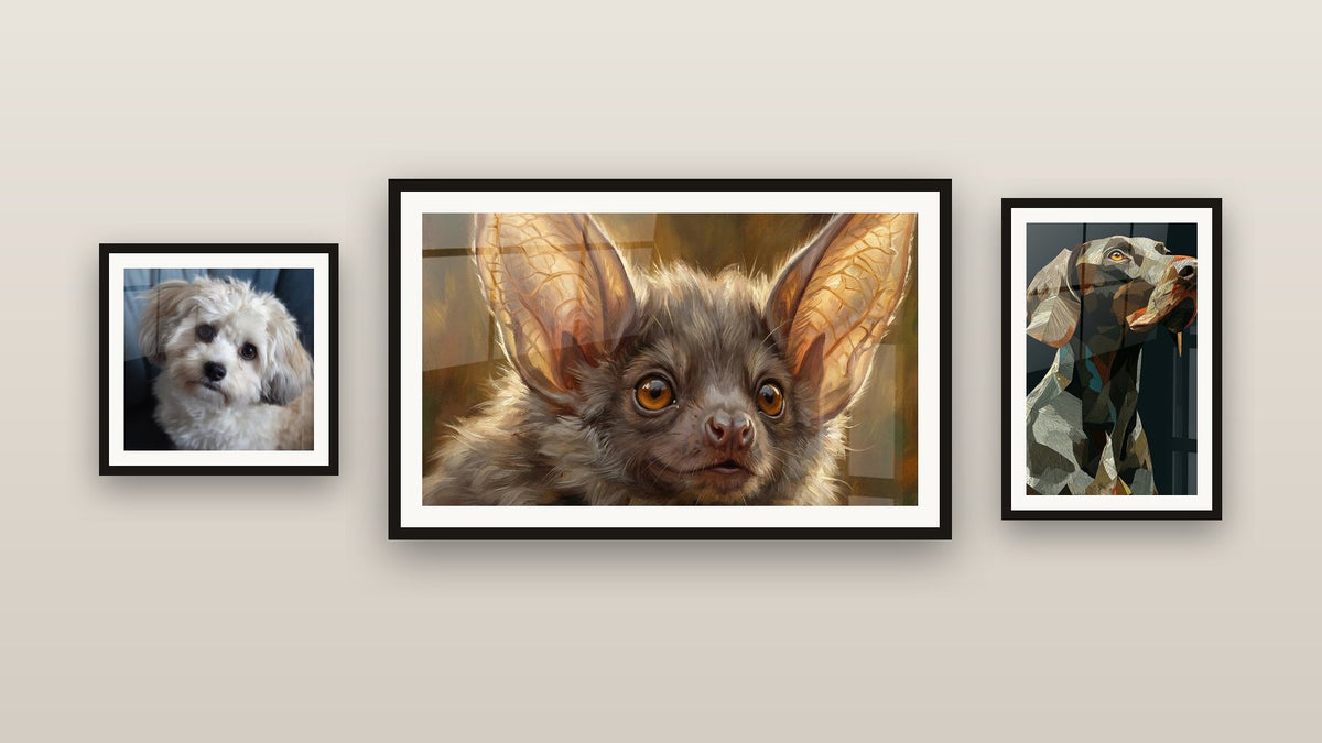 Gallery wall with three framed paintings