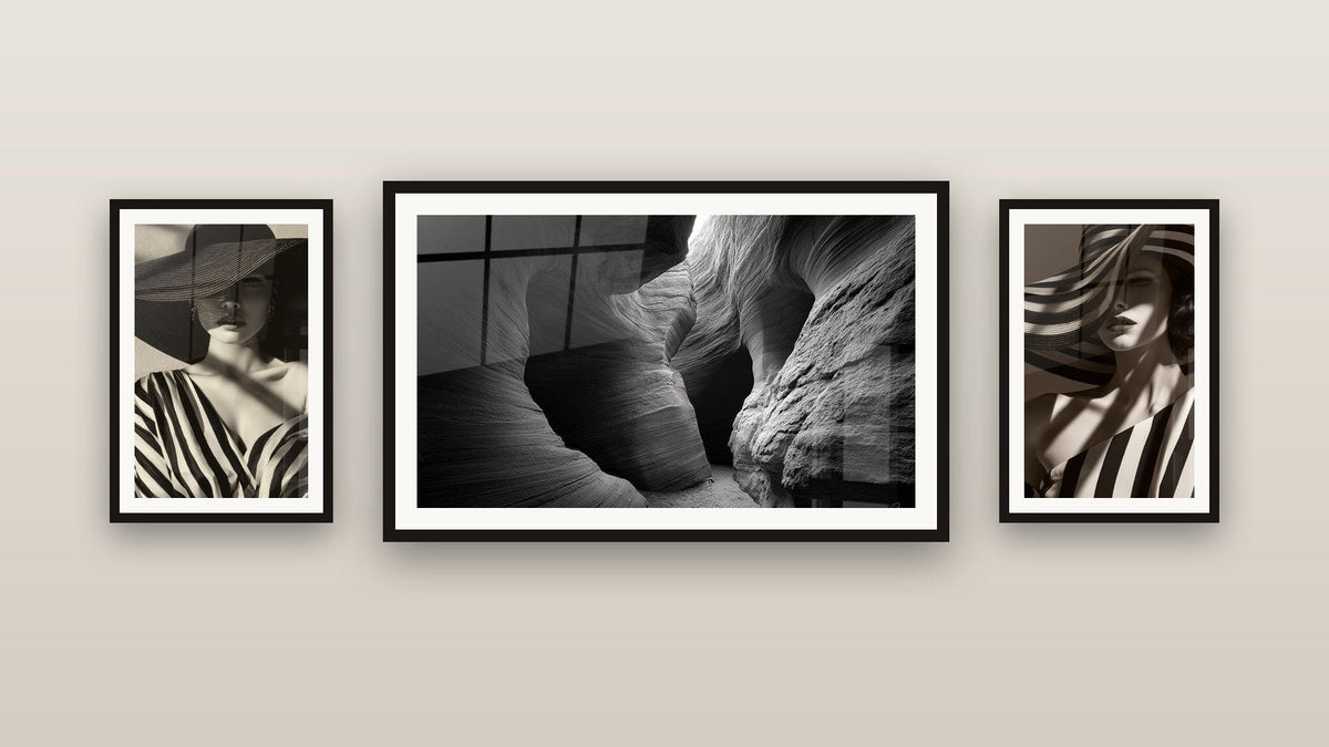 Pared de galería con tres cuadros enmarcados, entre ellos Cañón Esculpido