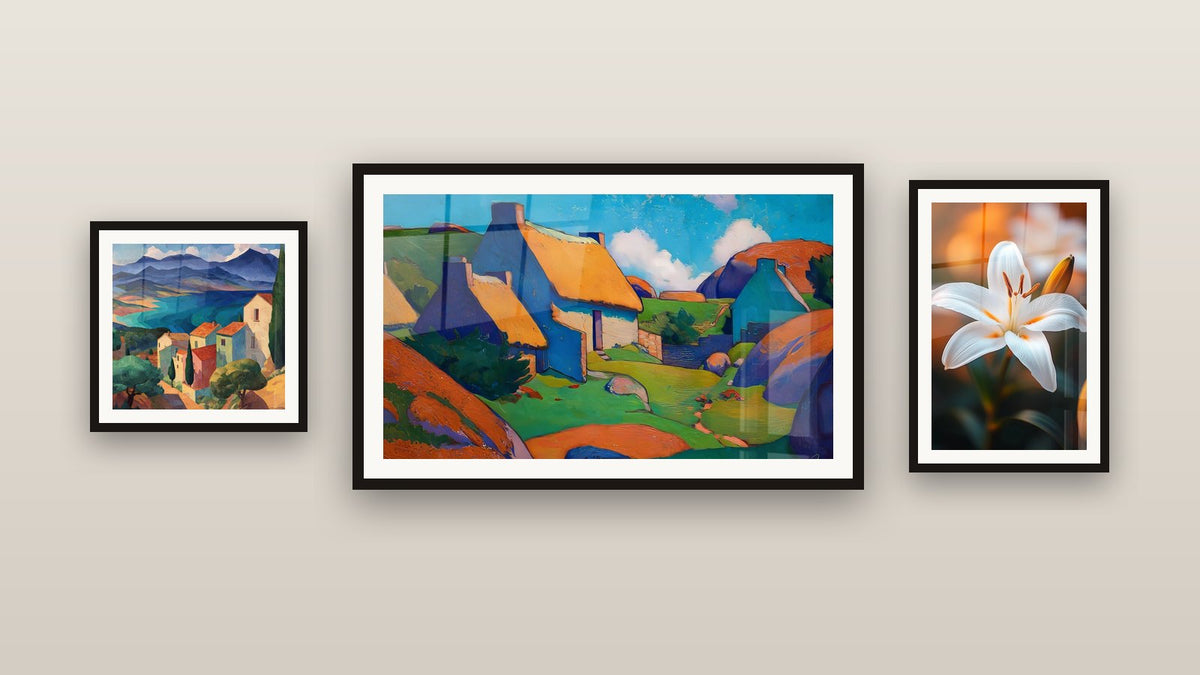 Gallery wall with three framed paintings: Mediterranean Village, Colorful Village and Lily Wall Art N°2