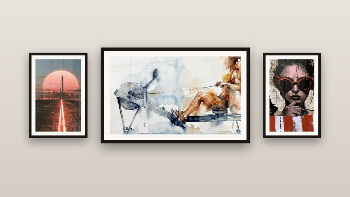 Gallery wall with three framed paintings, including Rower Crossfit and Neon Route to Coral Skyscraper