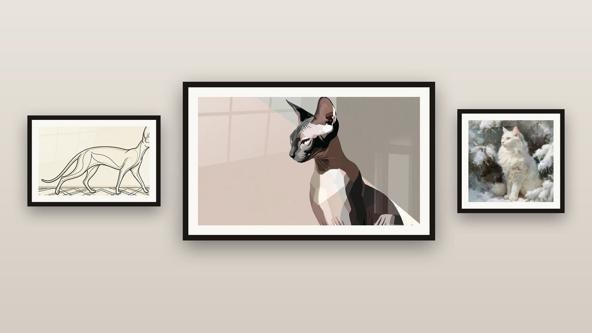 Gallery wall with three framed paintings, including Geometric Sphynx Cat and Turkish Angora White Cat in Snow