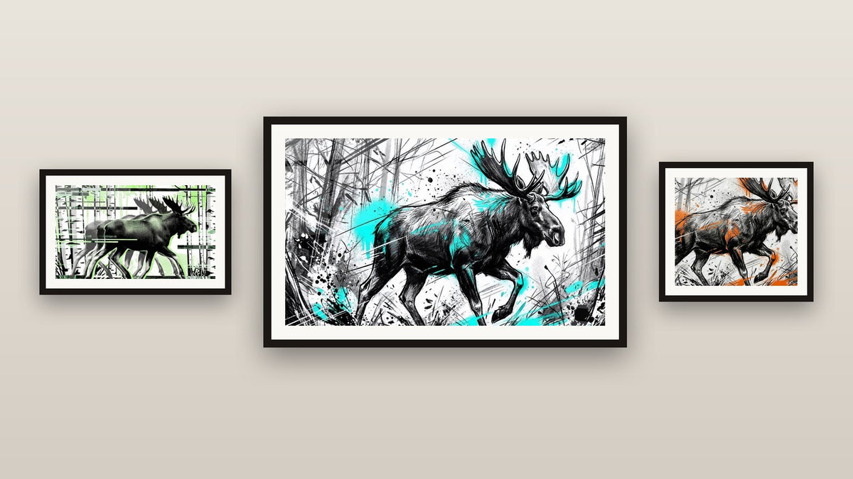 Mur de galerie avec trois tableaux encadrés, dont Élan Majestueux Traits Noirs et Orange et Élan Majestueux Noir et Turquoise