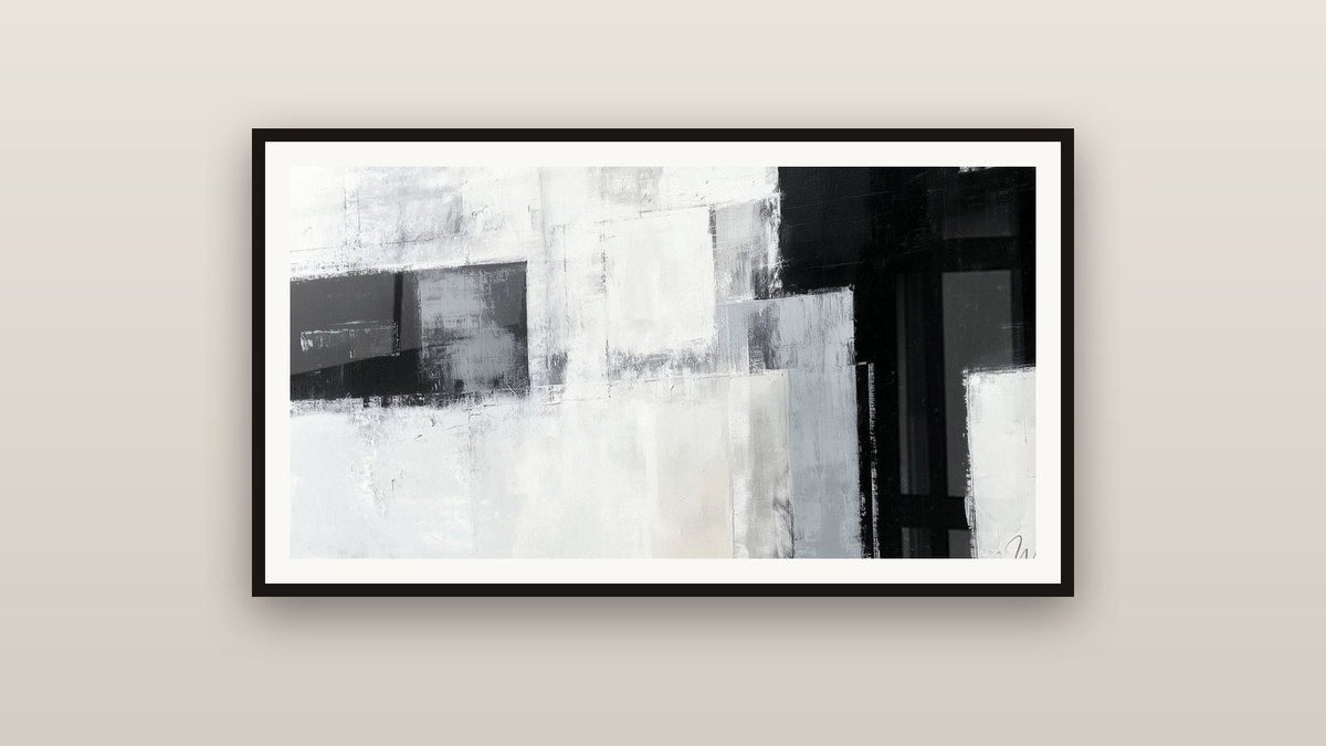 Tableau encadré sur un mur