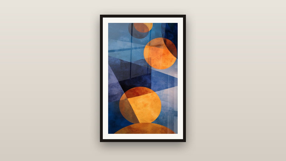 Tableau encadré sur un mur : Cercles oranges et bleus