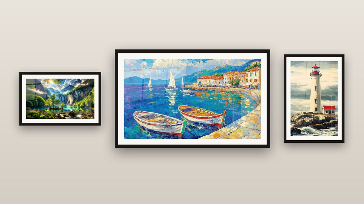 Gallery wall with three framed paintings, including Green Eden Waterfall