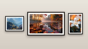 Gallery wall with three framed paintings: Mountain landscape, Misty Autumn Lake and Lily Wall Art N°2