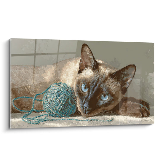 Tableau artistique d'un chat Tonkinois aux yeux bleus allongé près d'une pelote de laine turquoise