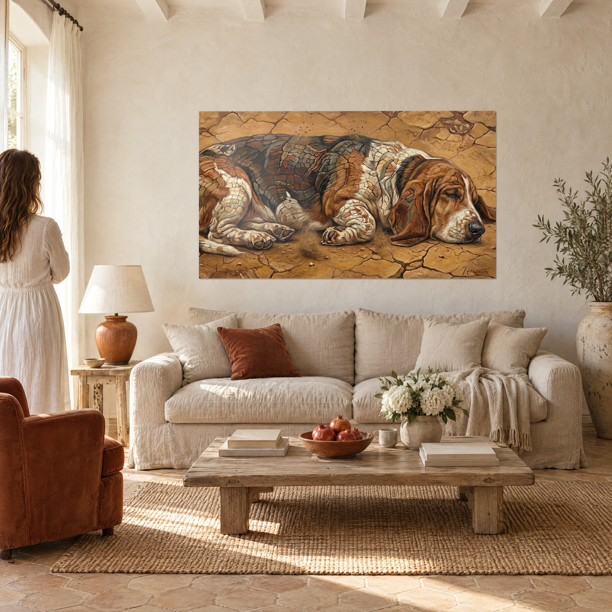 Wall art of a sleeping basset hound, red and white mosaic coat, on cracked ochre earth, hanging above a sofa in a bright living room