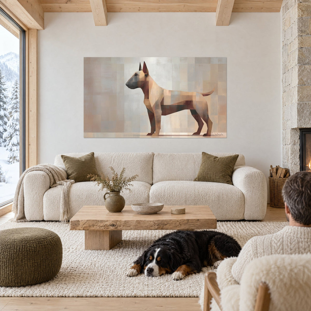 Wall art faceted bull terrier in profile, sand beige and rust brown, in front of a reclining dog, above a sofa in a bright living room