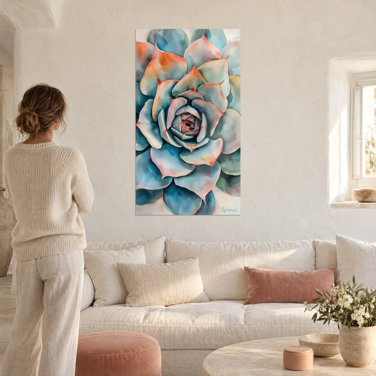 Wall art succulent watercolor rosette, turquoise and salmon petals, woman from behind, above a sofa in a bright living room