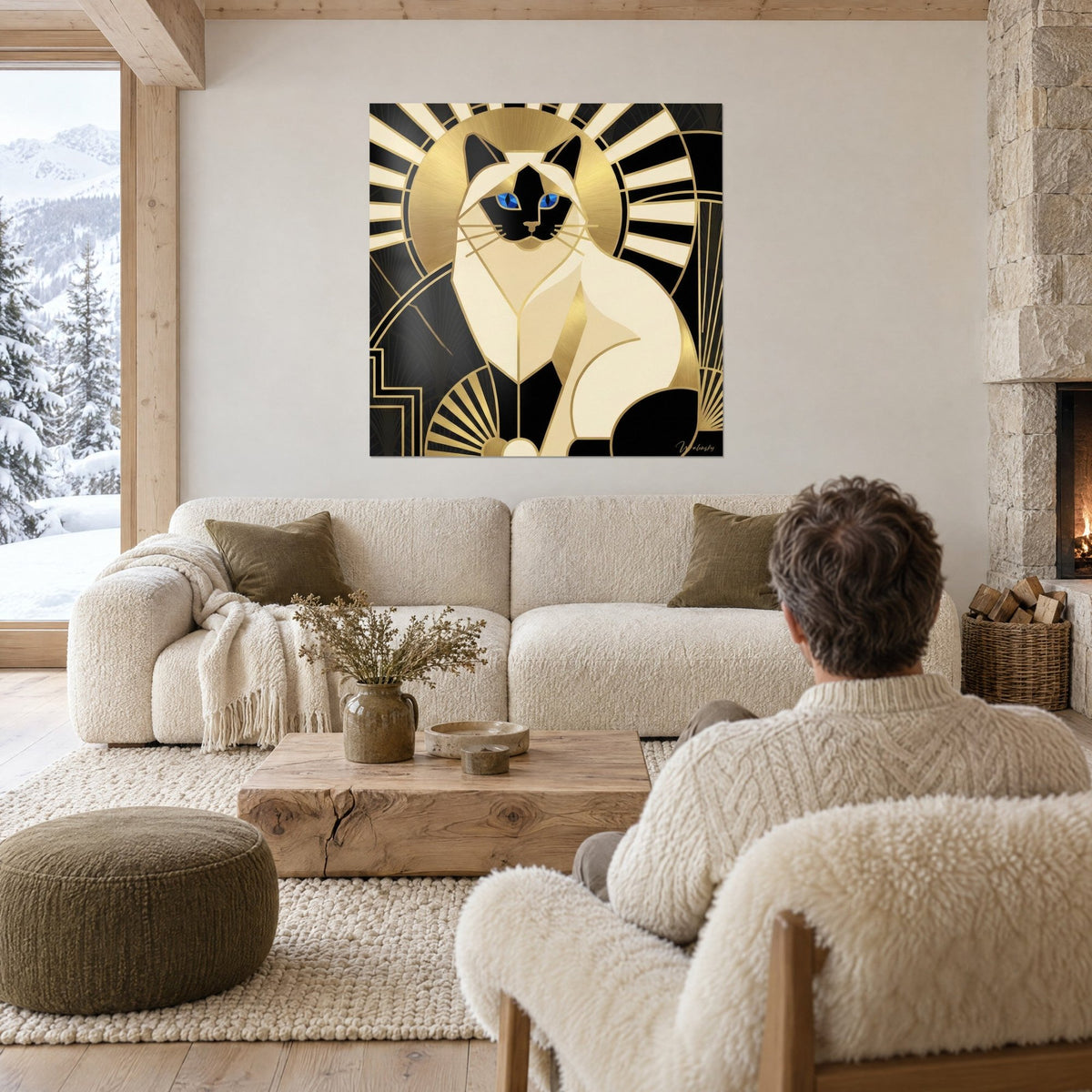 Tableau chat birman aux yeux saphir, halo doré et rayons noirs et ivoire, au-dessus d'un canapé dans un salon lumineux