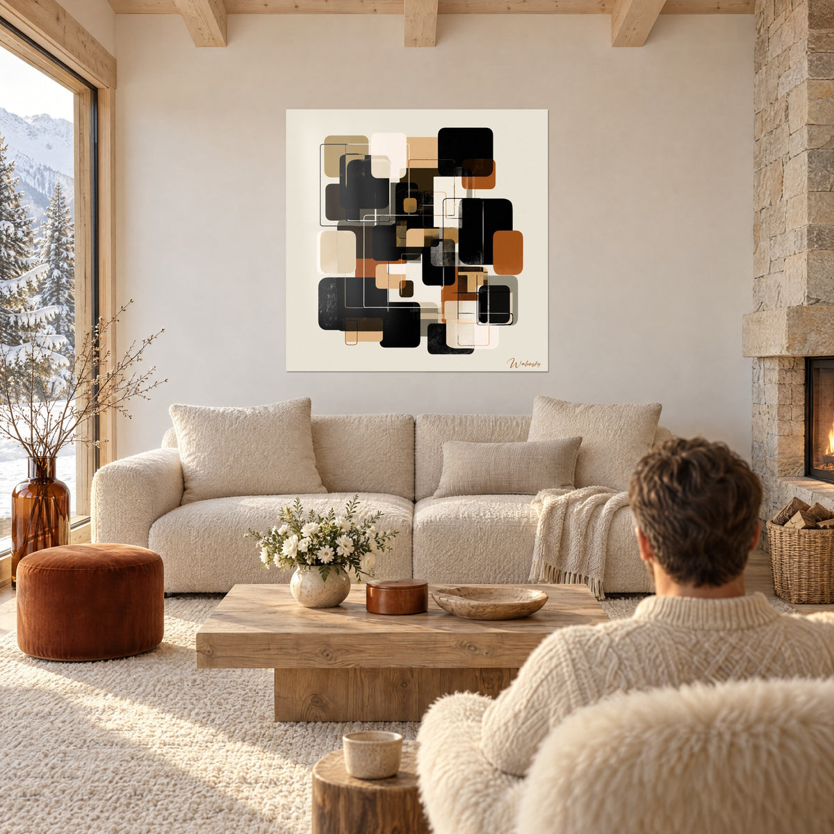 Tableau mosaïque de carrés arrondis noirs, caramel et crème, liserés fins, au-dessus d'un canapé dans un salon lumineux
