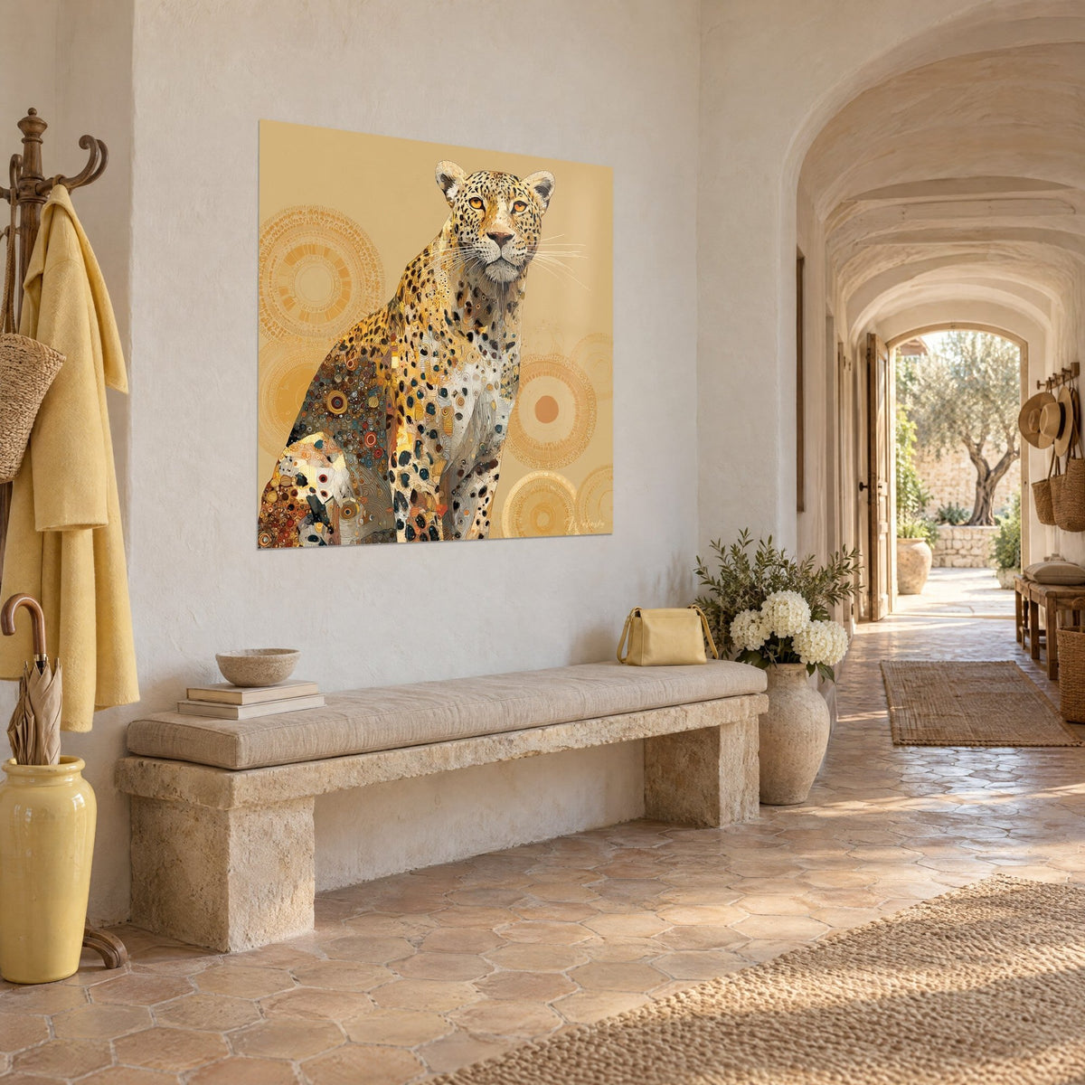 Wall art of a spotted wild cat with an orange gaze, ochre and cream-white coat, sandy background with golden circles, in a vaulted farmhouse corridor