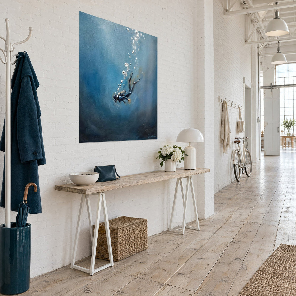 Oil painting of a diver gliding toward the indigo abyss, black fins and white bubbles, white wall of a loft