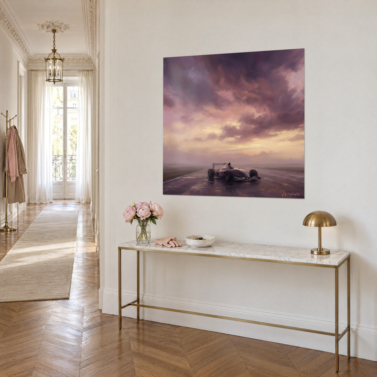 Wall art of a solitary race car in the mist, plum and peach clouds in brushstrokes, three-quarter view above a gilded console