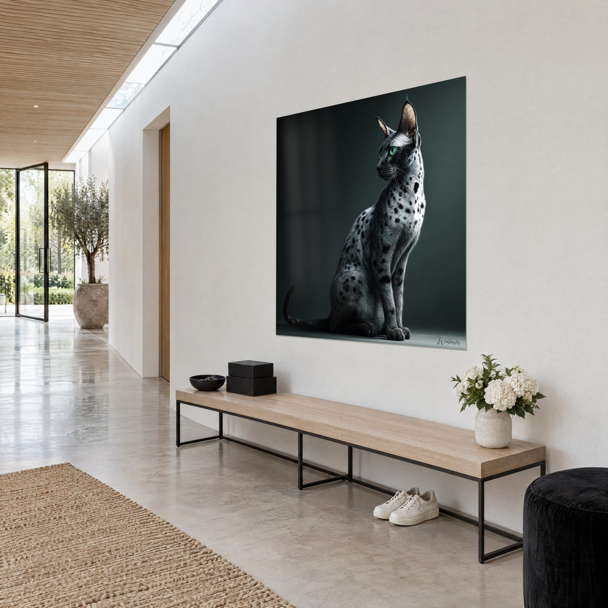 Wall art slender cat with pearl grey coat speckled with black, ears upright, seated on anthracite background, in an architect-designed house hallway