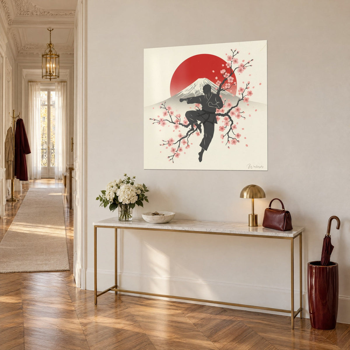 Wall art martial artist in charcoal grey kimono, snow-capped Mount Fuji and scarlet disc on a cream background, three-quarter view on a gilded console
