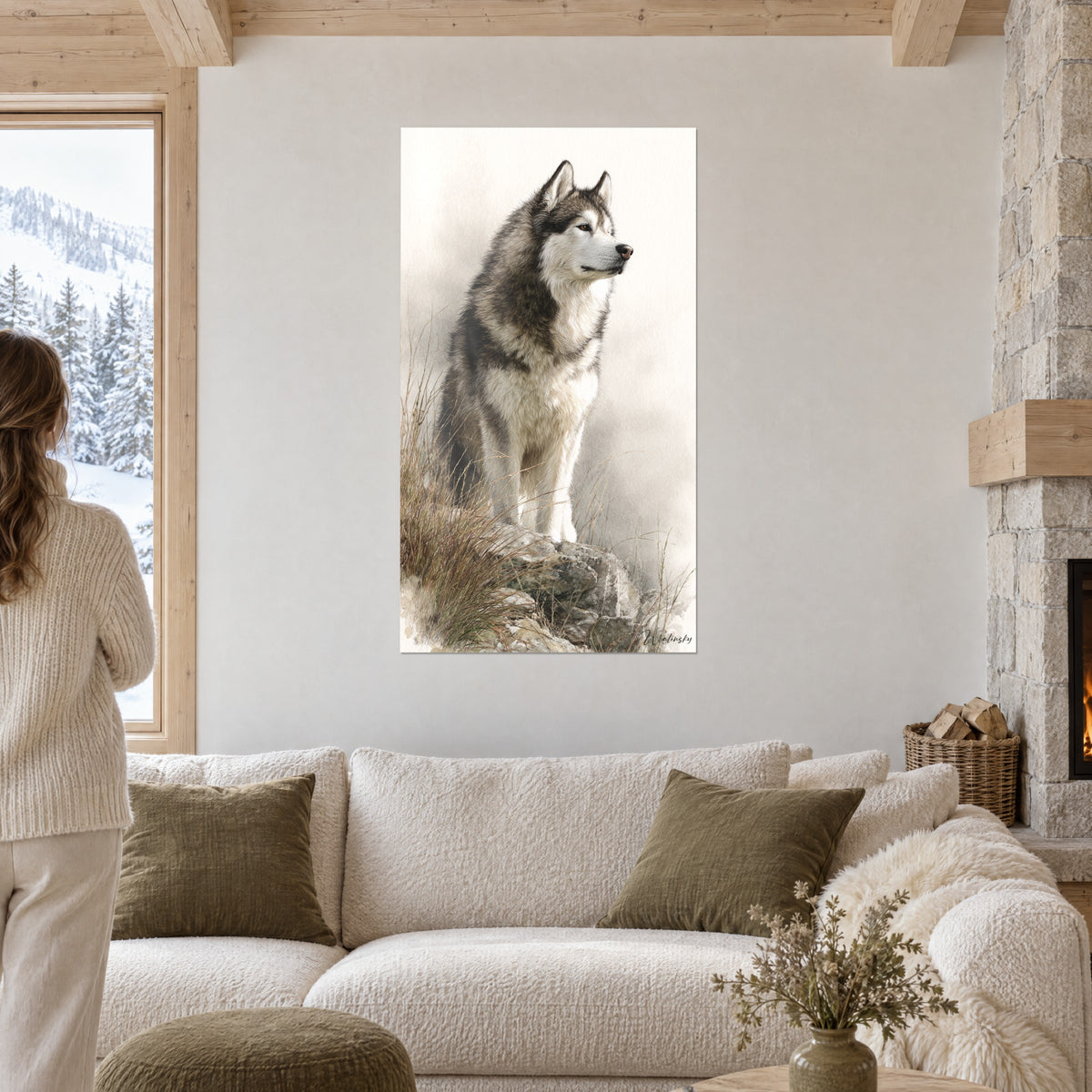 Cuadro de malamute de Alaska sentado sobre una roca, pelaje gris y crema en la niebla, encima de un sofá en un salón luminoso