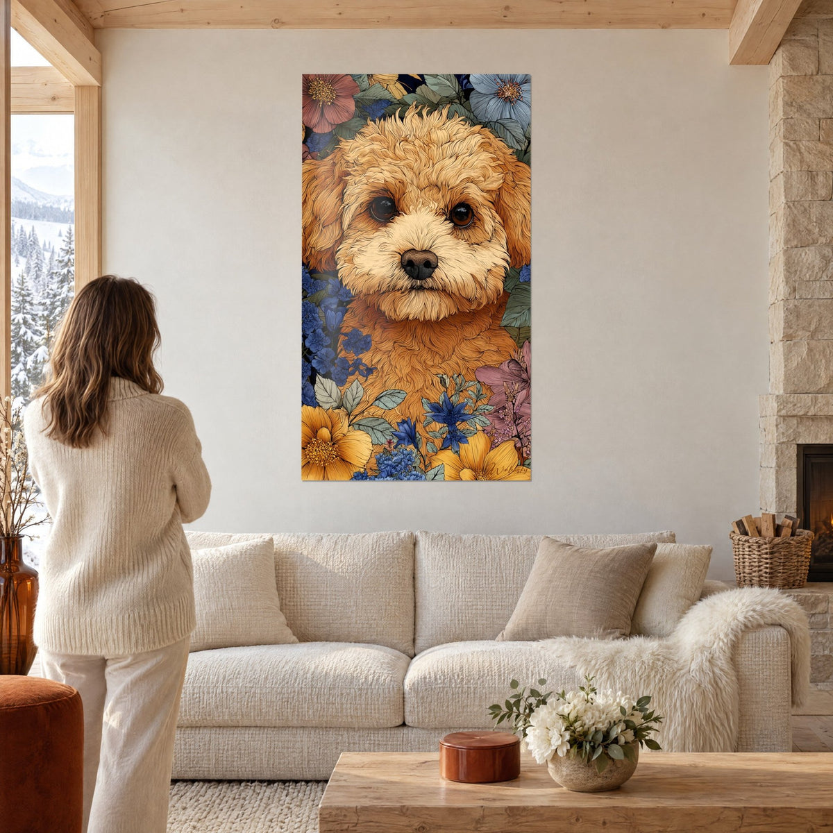 Wall art of an apricot poodle with dark eyes, surrounded by blue and ochre flowers, above a sofa in a bright living room