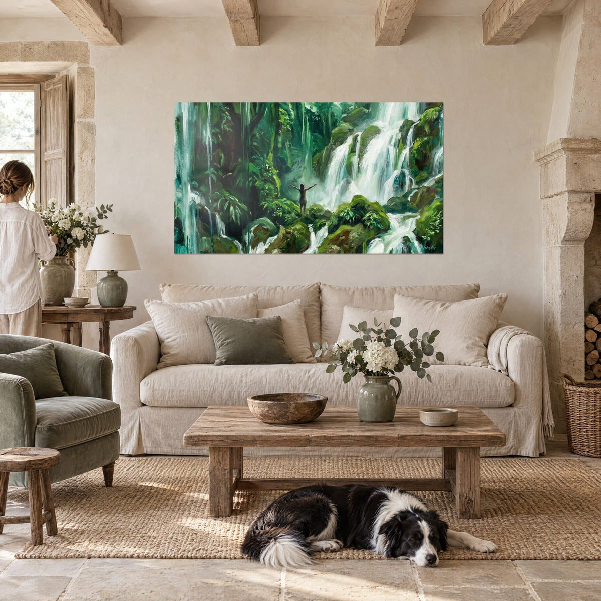 Wall art tropical waterfall in emerald green and foam white, silhouette with arms open, woman from behind, collie, above a sofa in a bright living room