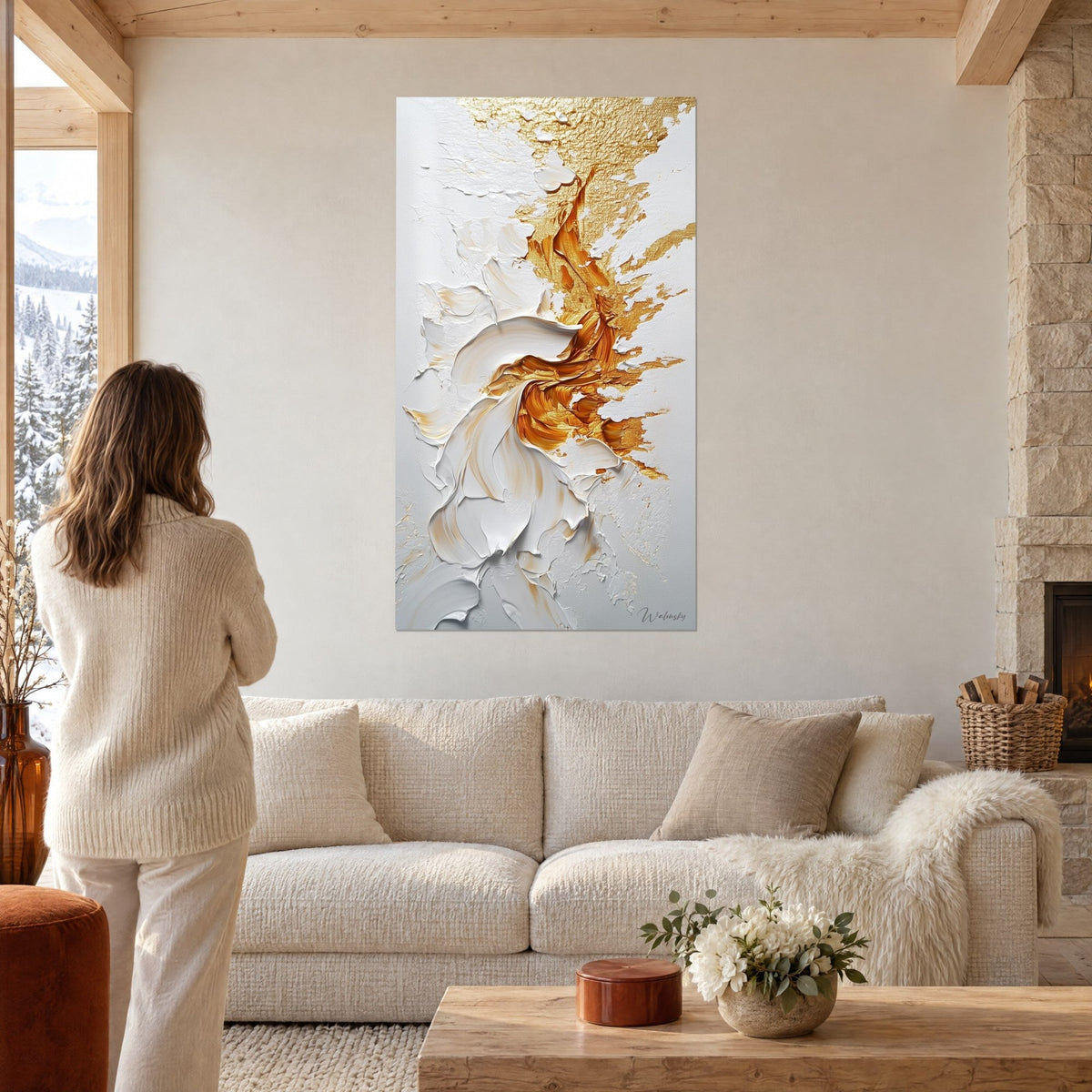 Wall art golden and pearly white swirl, thick ochre and ivory impasto, woman seen from behind, above a sofa in a bright living room
