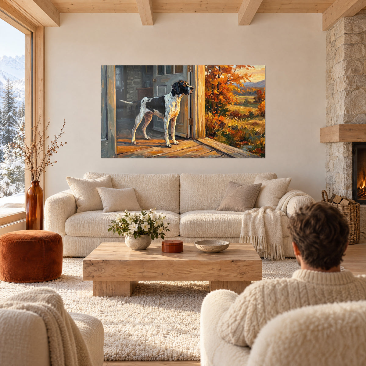 Gemälde eines schwarz-weiß gefleckten Jagdhundes, der über die rotbraune Landschaft blickt, über einem Sofa in einem hellen Wohnzimmer