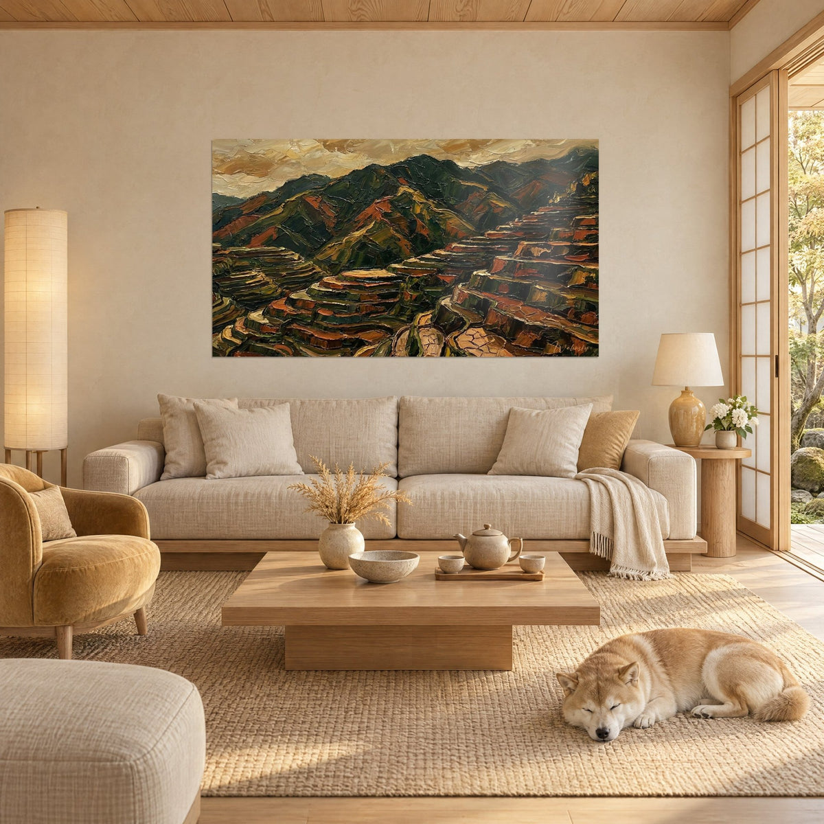 Wall art rice terraces in ochre and fir green under a golden sky, sleeping Shiba above the sofa in a bright living room