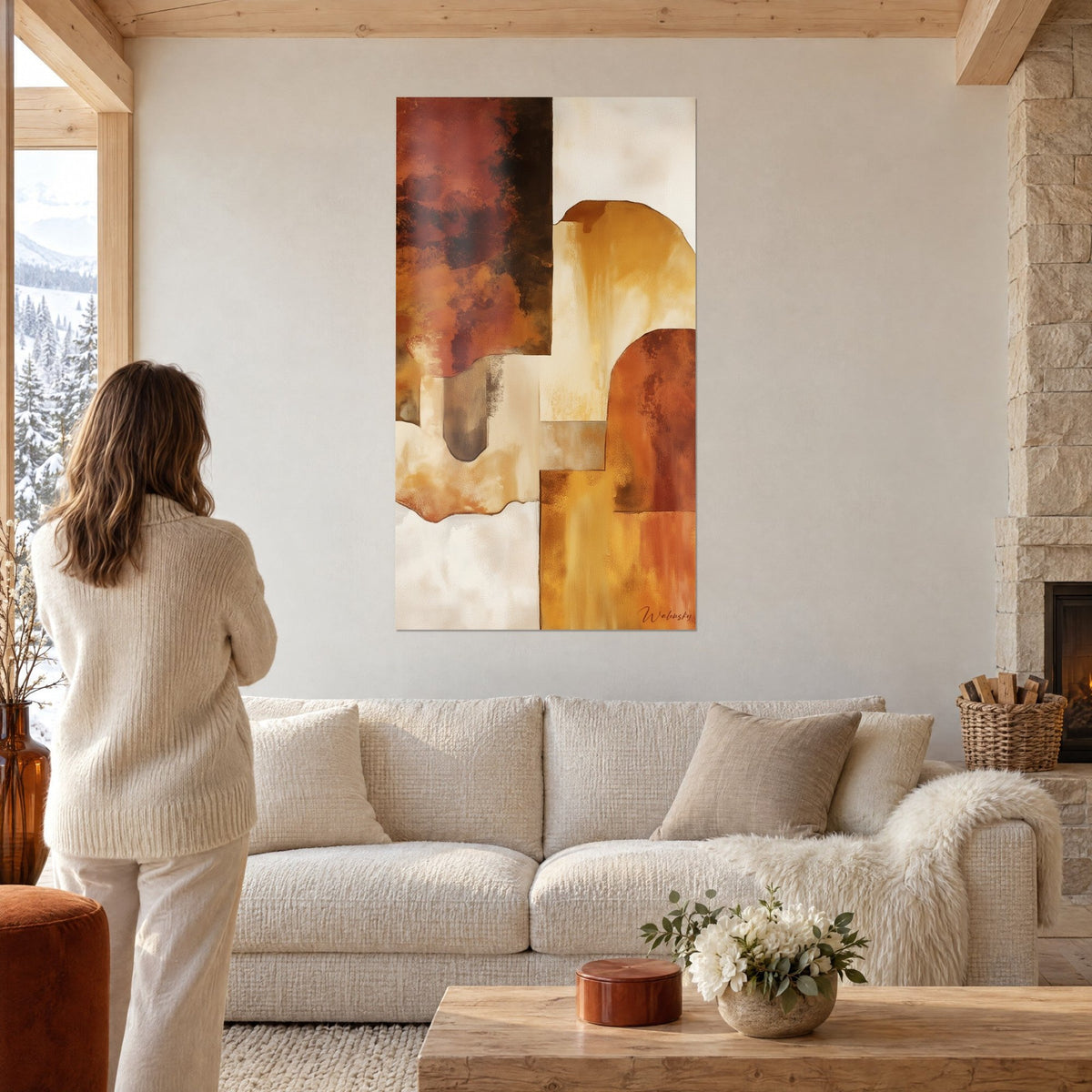 Wall art with geometric shapes in ochre and rust, large solid blocks and golden arches, above a sofa in a bright living room
