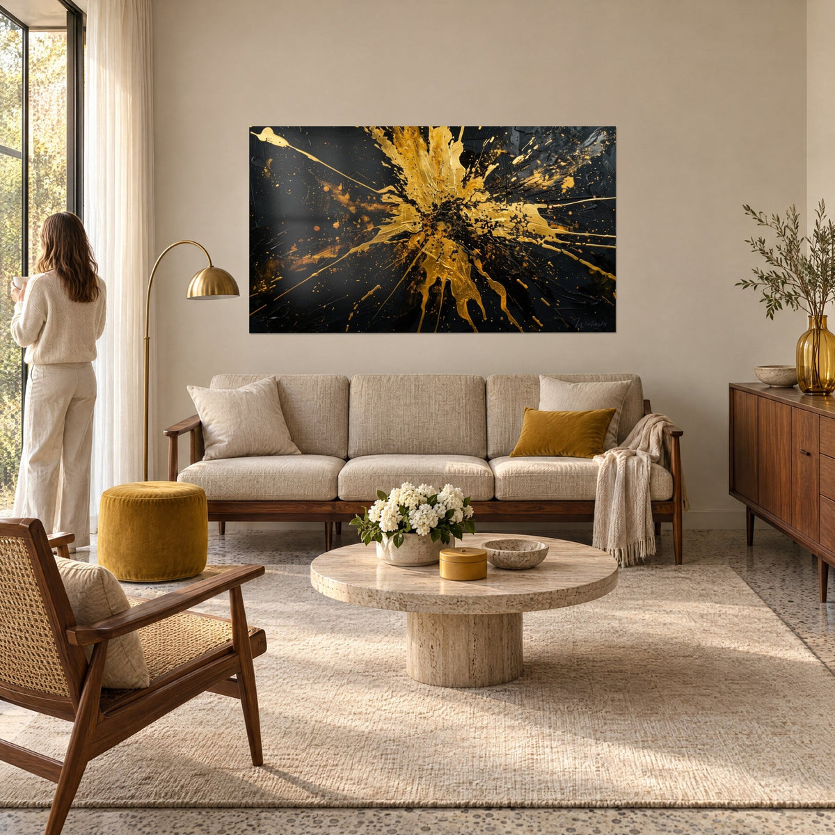 Wall art liquid gold explosion on black background, splashes and metallic streaks, above a sofa in a bright living room