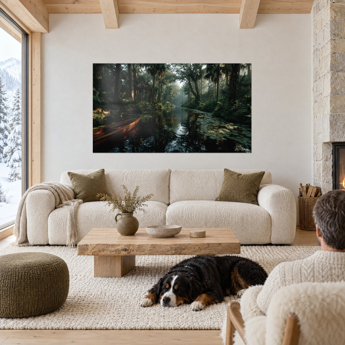 Wall art red wood dugout canoe on black river, green water lilies and golden mist, above a sofa in a bright living room