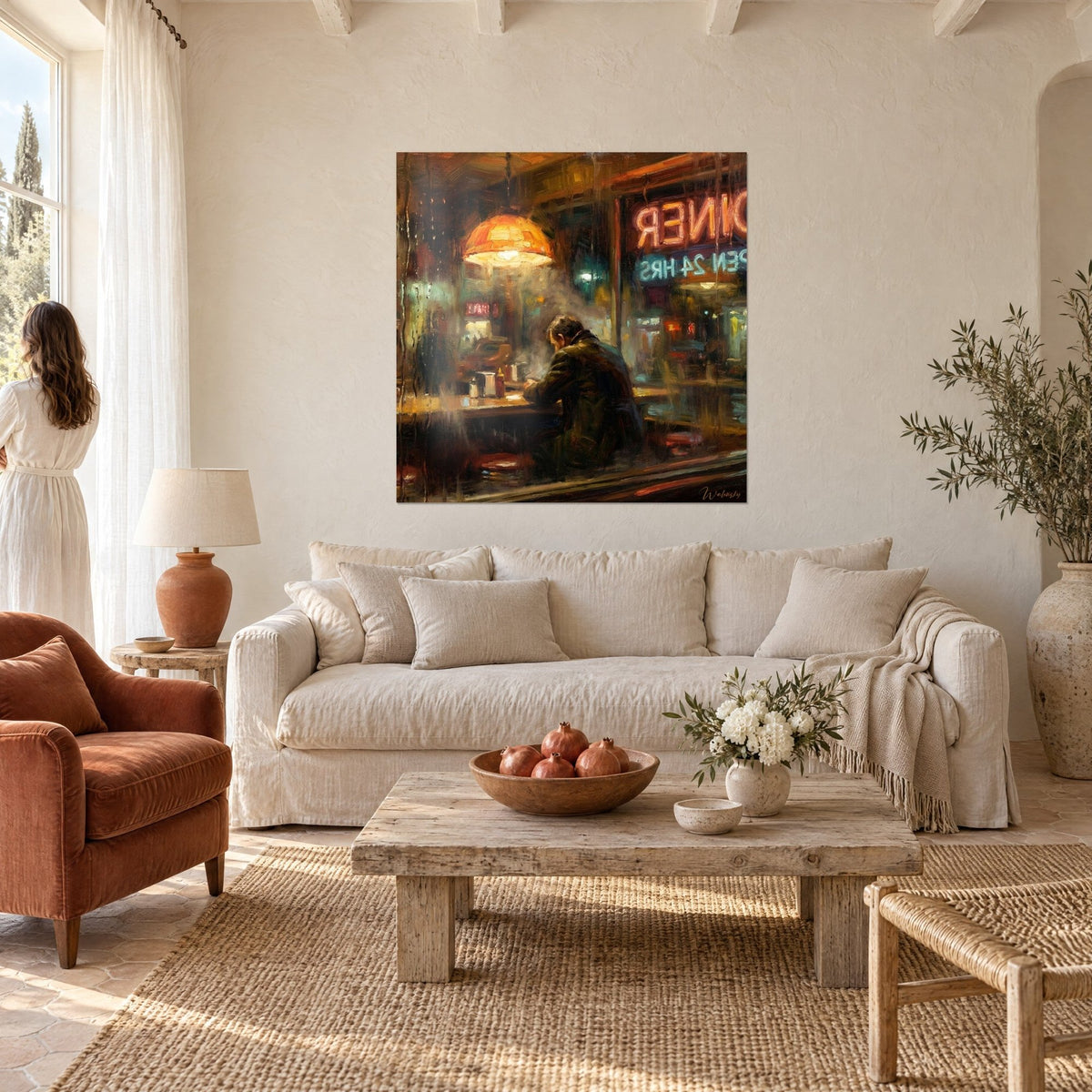 Wall art of a hunched man at the counter of a diner in the rain, orange lamp and blue neon, above a sofa in a bright living room