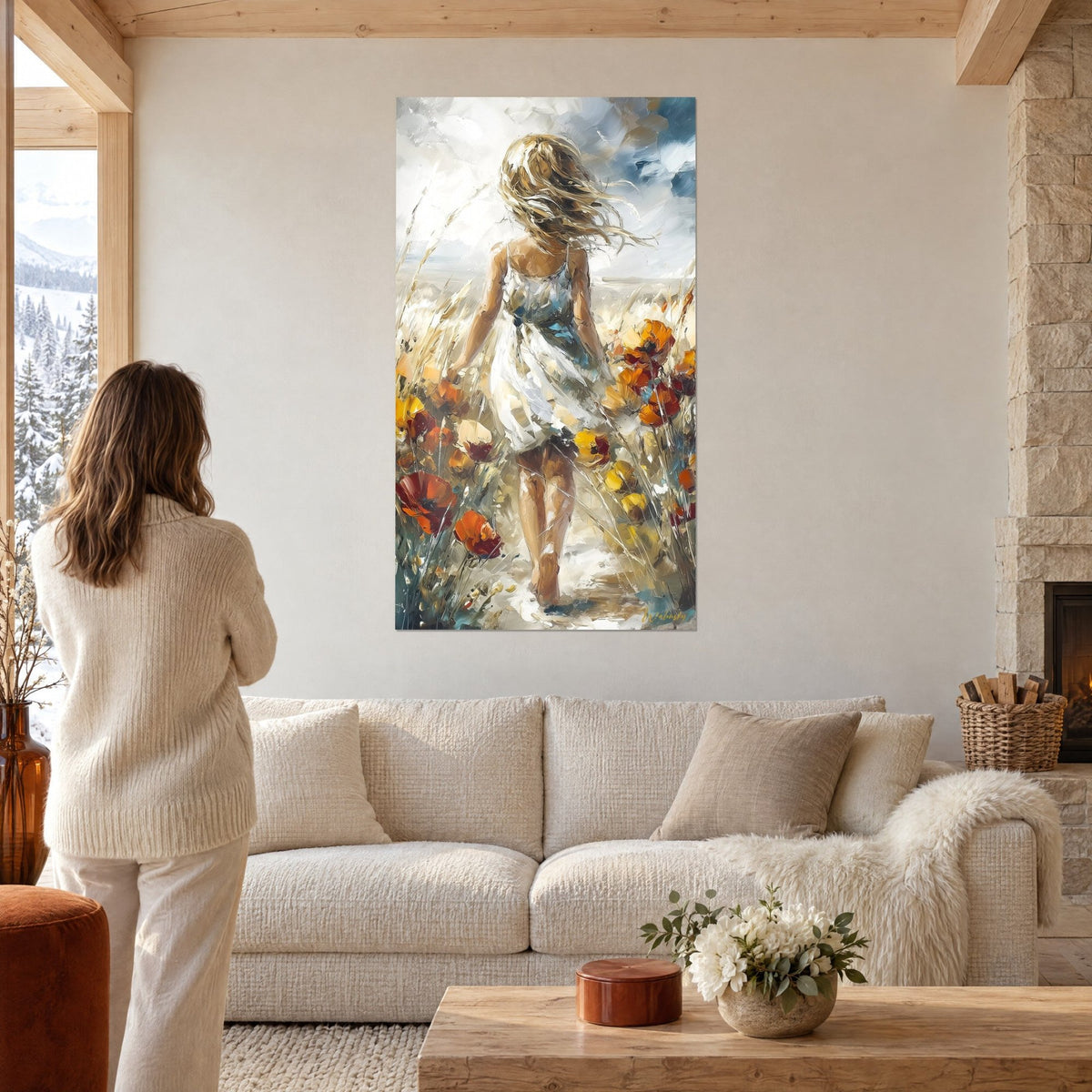 Tableau jeune femme de dos en robe blanche au cœur des coquelicots orangés, cheveux au vent, au-dessus d'un canapé dans un salon lumineux