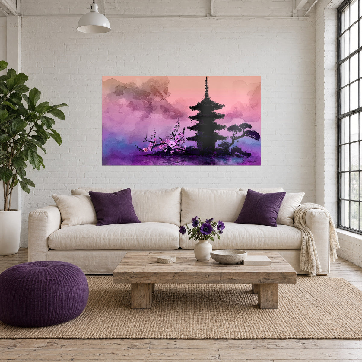 Schilderij van een zwarte vijfverdiepingen pagode tegen een roze en paarse lucht, bloeiende kersentak, boven een bank in een lichte woonkamer