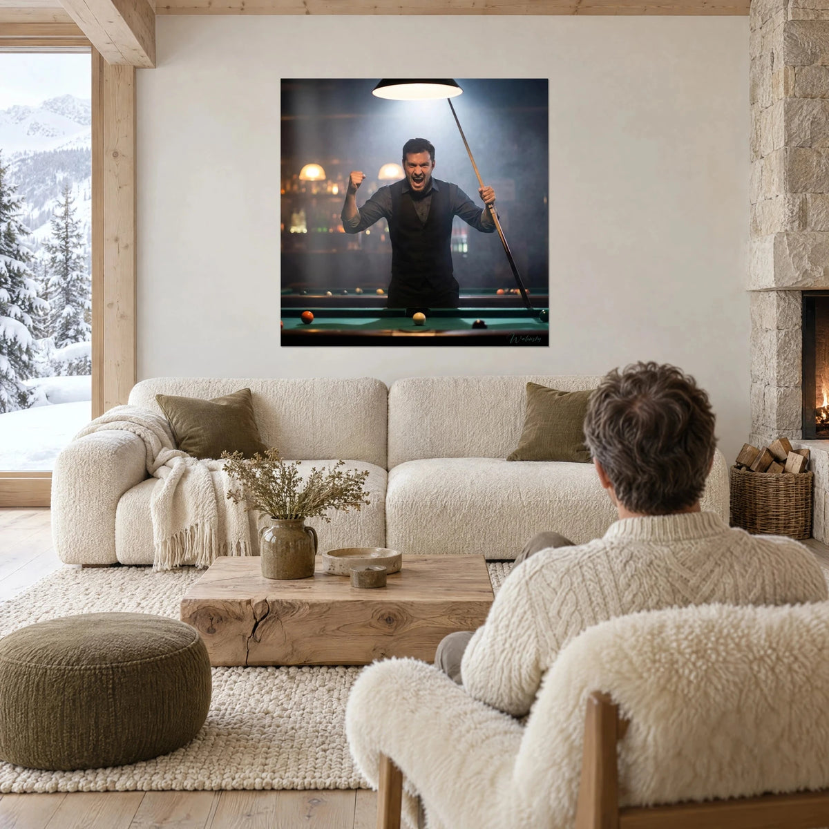 Wall art billiards player with raised fist, black waistcoat and green felt table, cue in hand, above a sofa in a bright living room