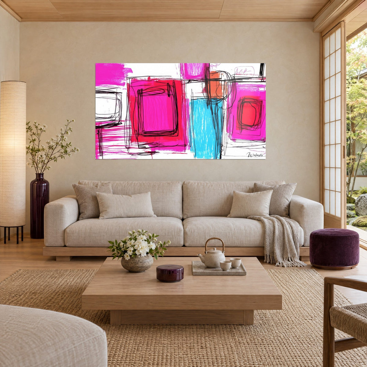 Wall art abstract fuchsia and red squares outlined in black lines, turquoise accent, above a sofa in a bright living room