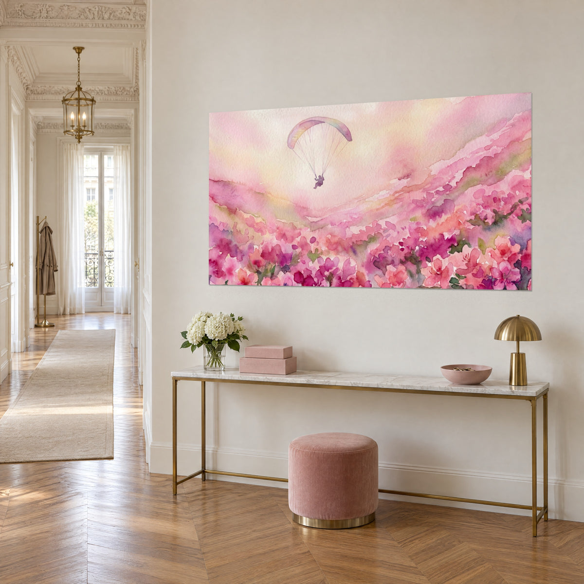 Cuadro vela de parapente rosa y amarillo pálido flotando sobre un cielo crema, valle de azaleas magenta, consola dorada en la entrada de estilo haussmanniano