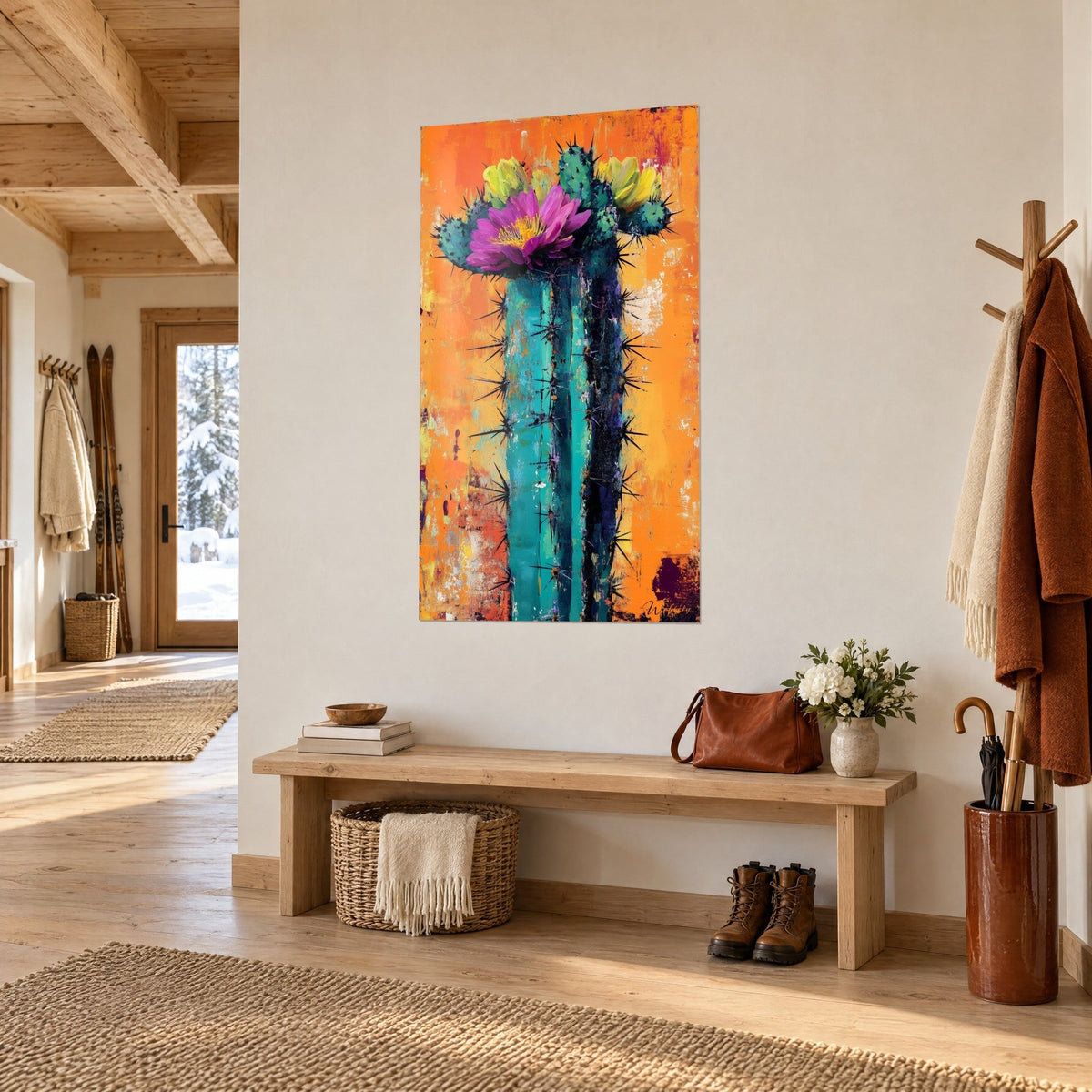 Tableau colonne de cactus bleu-vert aux épines noires, pétales magenta et orange vif, dans l'entrée d'un chalet boisé