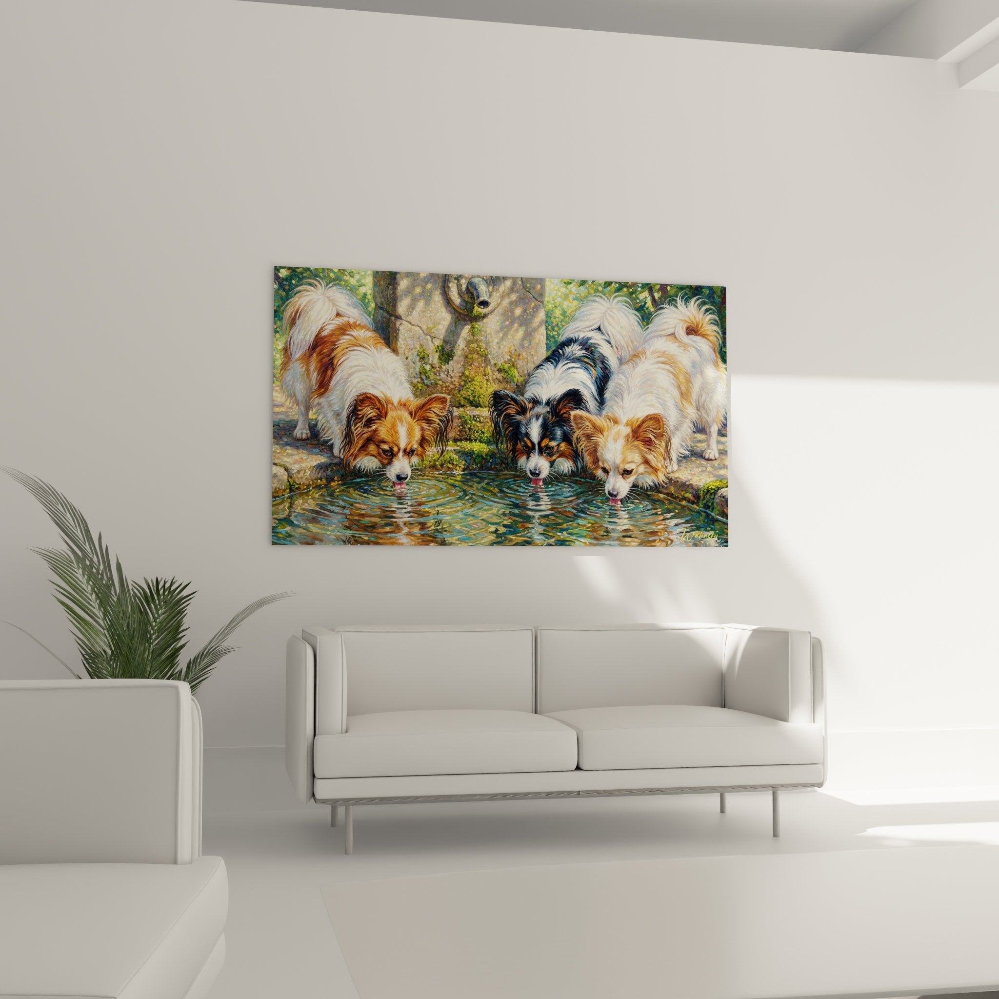 Détail des trois chiens Papillon aux pelages roux, noir et blanc se désaltérant dans l'eau cristalline