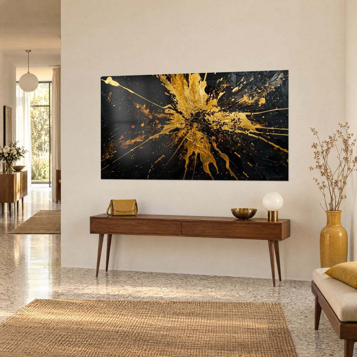 Wall art gold paint burst erupting on jet black, ochre drips and fine sparkles, wooden console table in an entryway