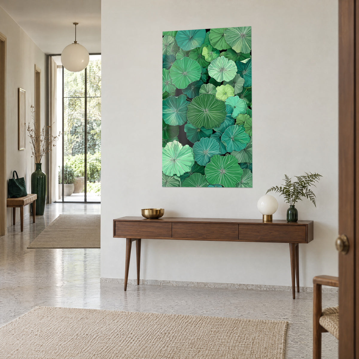 Wall art vault of large plant discs in sage green and teal, black background, three-quarter view of a wooden console, bright entrance hall