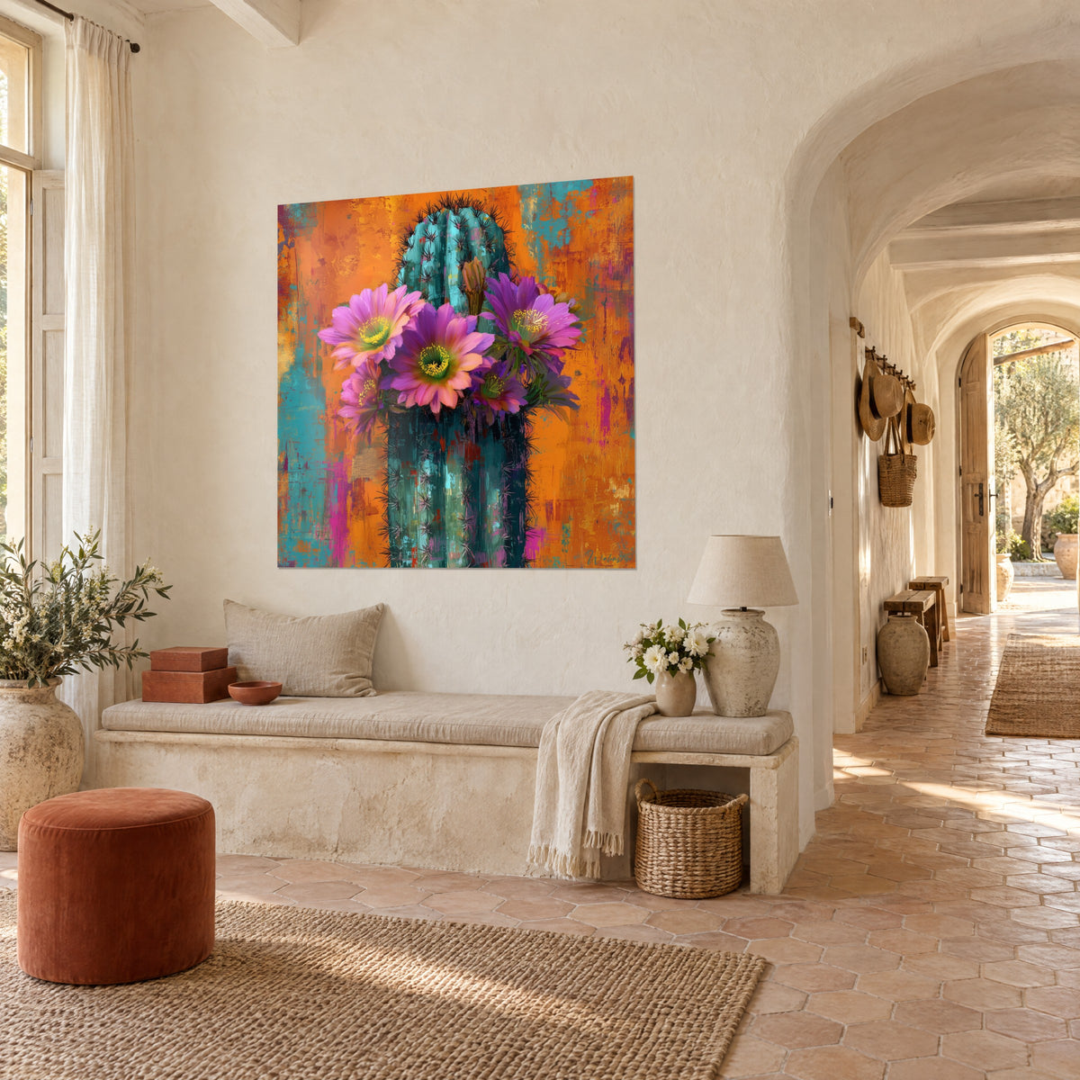 Wall art verdigris cereus cactus with violet-pink blooms on an orange background, hung near a light stone archway