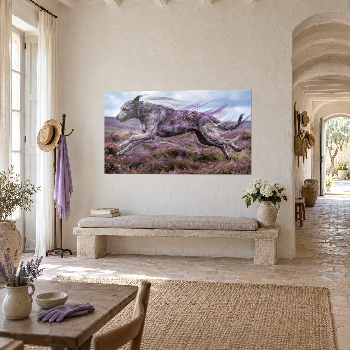 Wall art of a silver-grey Irish wolfhound in full gallop, mane of amethyst streaks over pink heath, cream wall of a Provençal farmhouse