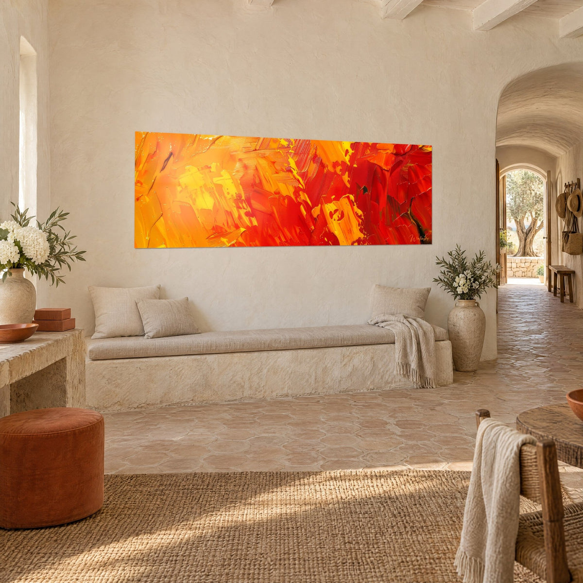 Wall art fire explosion in broad knife strokes of yellow, orange and carmine, whitewashed wall and stone bench of a Provençal farmhouse