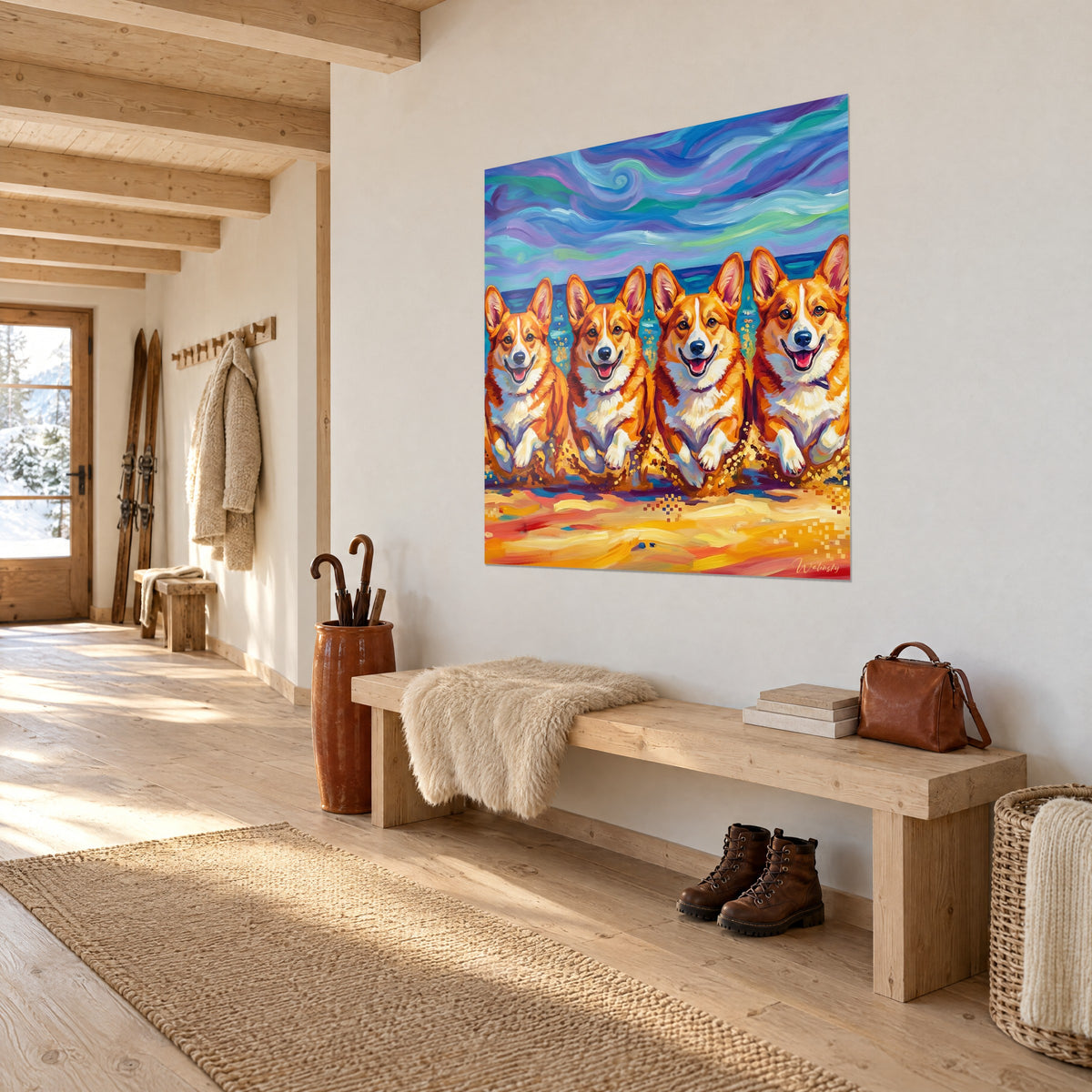 Quadro cani pembroke con la lingua rosa, sabbia dorata schizzata, mare turchese, appeso in un ingresso in legno chiaro